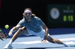 开云体育中国官网-意大利网球队翻盘世界网球队，西西帕斯制霸全场